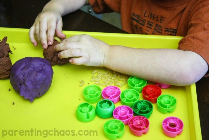 This simple invitation to create Gruffalo Play Dough is a fantastic way to spend time together while exploring this classic story!