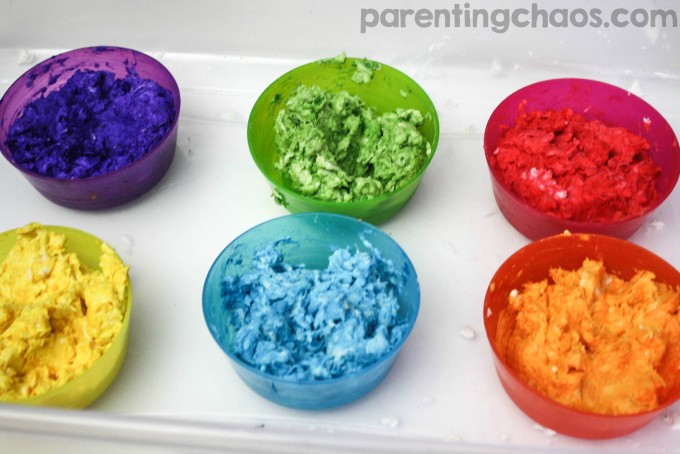 Ever had your child soak a roll of toilet paper? Instead of throwing it away turn it into this super fun Rainbow Clean Mud!