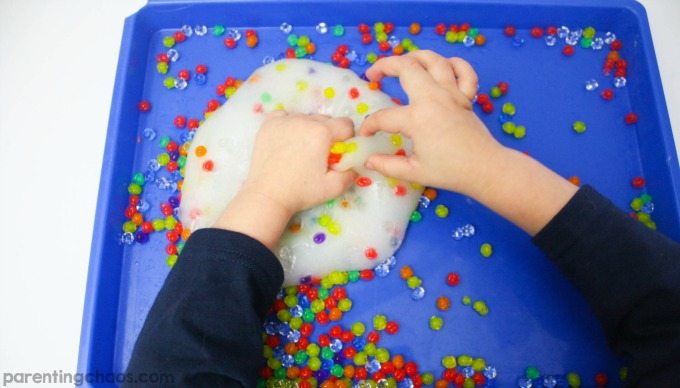 Learning how to make waterbead slime is a super fun science activity! Plus it is a fun sensory bin to play with afterwards!