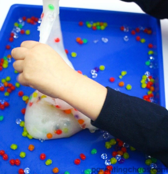 Learning how to make waterbead slime is a super fun science activity! Plus it is a fun sensory bin to play with afterwards!