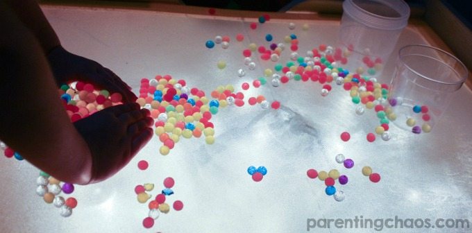 Playing with water beads and shaving cream on the light table is so simple and mesmerizing! My kids would LOVE this!
