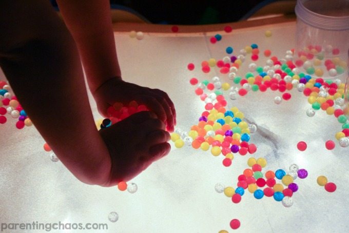 Playing with water beads and shaving cream on the light table is so simple and mesmerizing! My kids would LOVE this!
