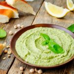 This Basil Pesto Hummus Recipe is a mouthwatering combination of two delectable spreads. You will want to put this on everything!
