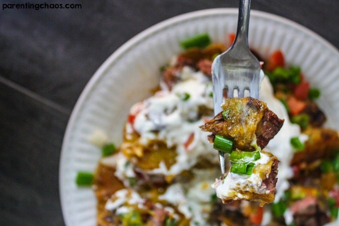 These delicious Loaded Steak Potato Nachos are a quick meal solution that can feed a crowd in a pinch.
