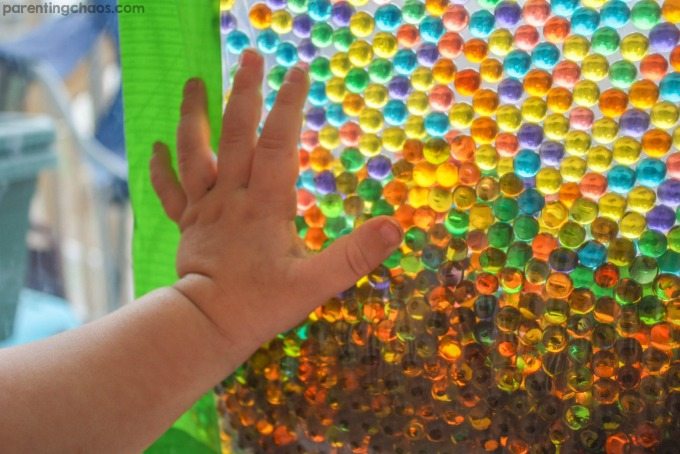 This water bead sensory window bag is one of our favorite ways to distract the kids with mess-free sensory play...the perfect solution when you need a moment to tackle the mess! #SCJMessyMoments