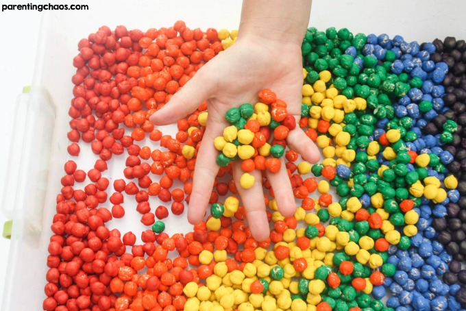 Rainbow Dyed Chickpeas are a quick and easy sensory bin filler that kids will love!