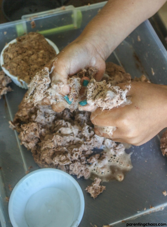 Ever had your child soak a roll of toilet paper? Instead of throwing it away turn it into this super fun Chocolate Scented Clean Mud!