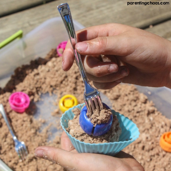 Make some home made chocolate moonsand with this easy recipe for a wonderful sensory play experience for kids! This recipe only uses 3 simple ingredients and it's gluten free so all can play.