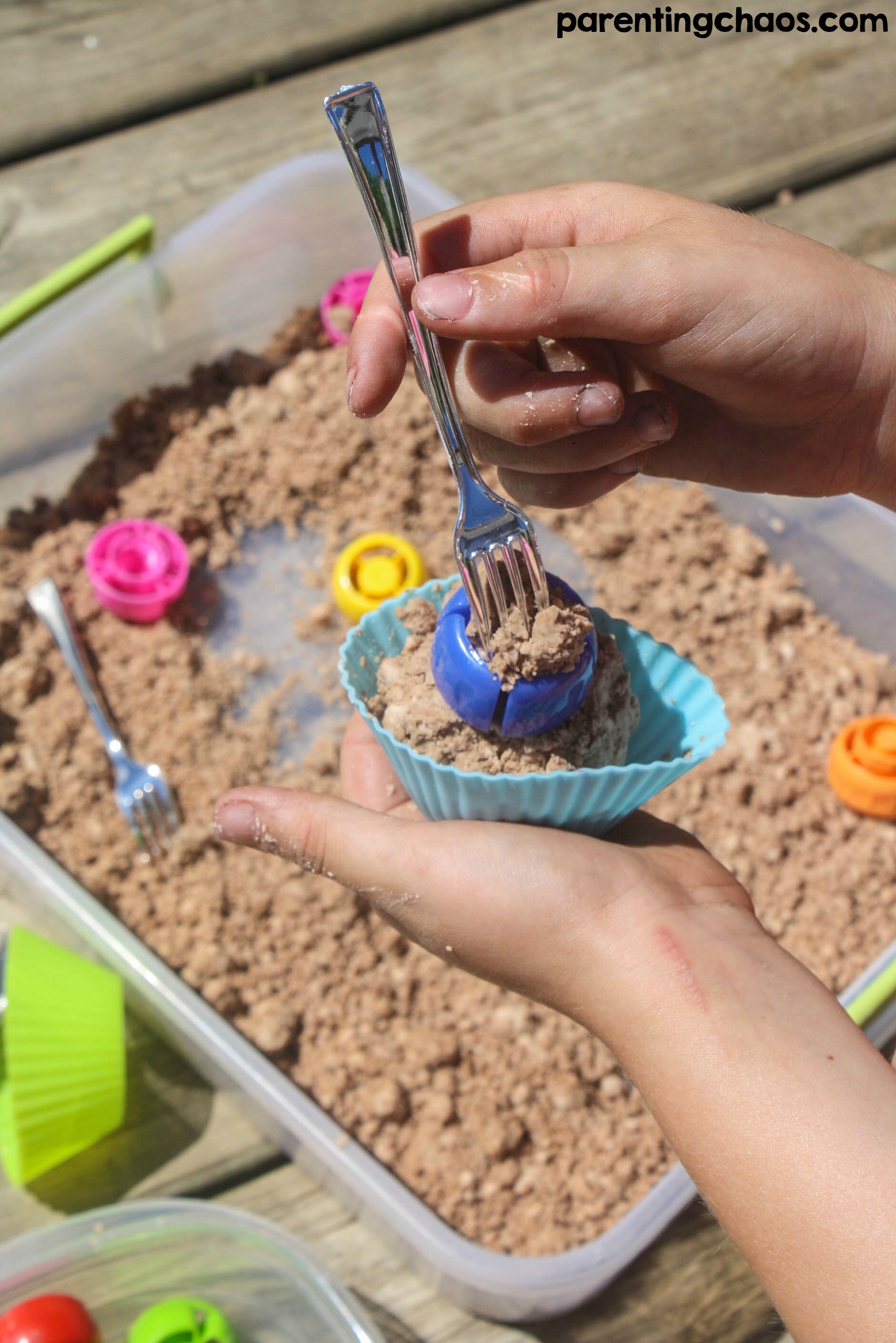 Make some home made chocolate moonsand with this easy recipe for a wonderful sensory play experience for kids! This recipe only uses 3 simple ingredients and it's gluten free so all can play.