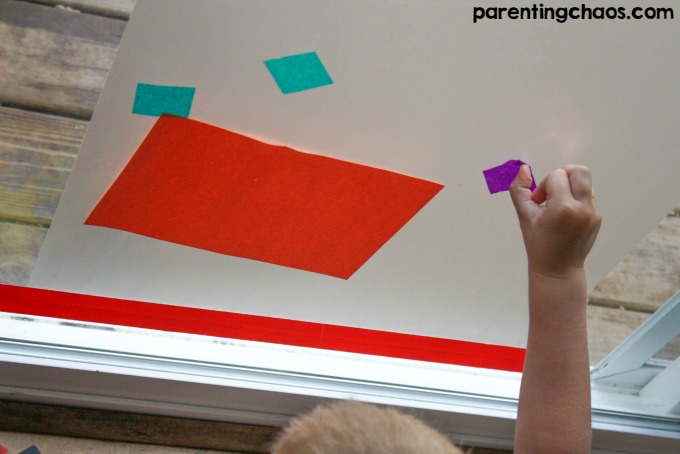 Providing open-ended creative activities such as this Scissor Skills Sticky Window Mural is a great way to encourage kids to continue to build upon their skills while controlling the mess.