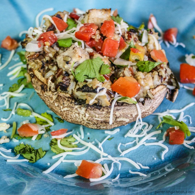 Grilled Portabello Mushrooms with Pork, Rissoto, and Cheese are a fun stuffed mushroom recipe for the grill!