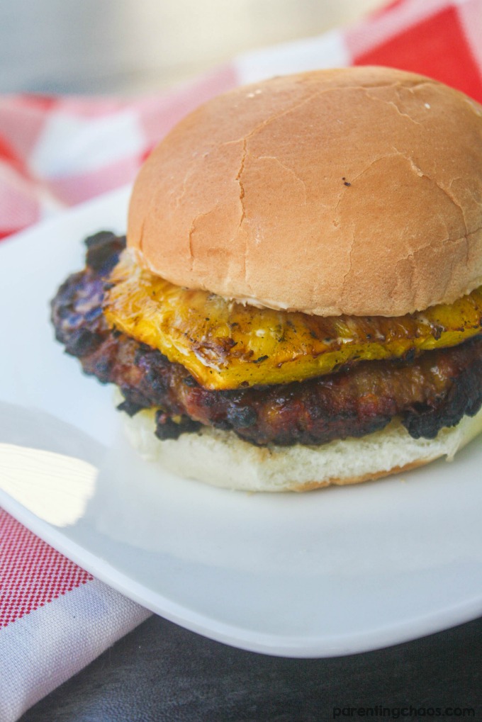 This Hawaiian brat burger blends the classic hamburger with the classic flavors of bratwurst. Topped with delicious grilled pineapple this is a must try grill recipes.