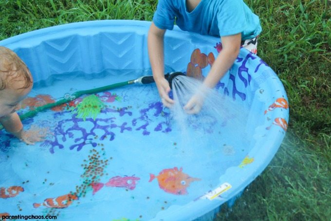 Previously, we’ve discovered ways to explore with water beads. Another favorite of ours is a sensory pool as it’s great for the visual sensory system.