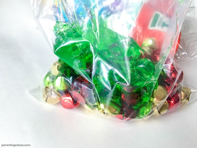 Make Jingle Bell Sensory Bags for kids to squish and play. These are fantastic taped to a window too!