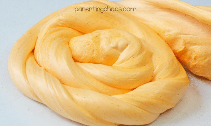 fluffy pumpkin slime rolled into a spiral