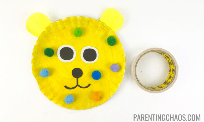 dr seuss put me in the zoo craft step 7 glue on the pompom polka dots