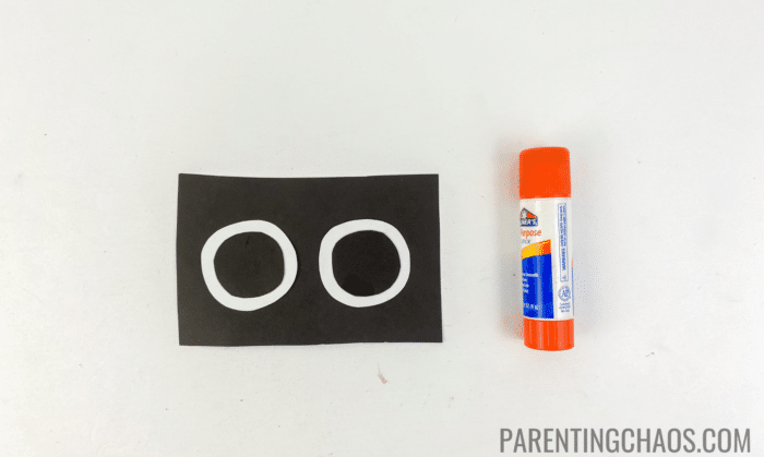 dr seuss put me in the zoo craft step 3: glue the black circles on top of the white circles to create the eyes