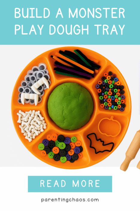 Monster playdough tray setup with Halloween-colored buttons, beads, vampire fangs, and rolling pins.
