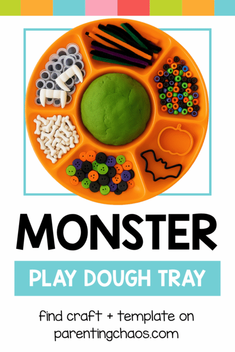 Monster playdough tray with Halloween-colored loose parts and a green playdough ball in the center.