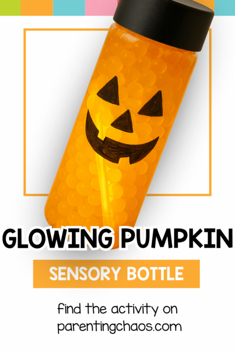 A bright orange sensory bottle with a jack-o’-lantern face and black lid, glowing under soft light. The text reads “Glowing Pumpkin Sensory Bottle.”