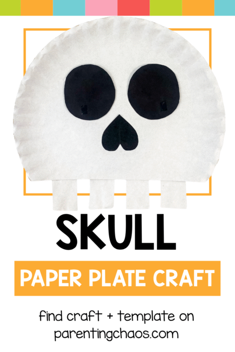 Skull paper plate craft with black eyes and heart-shaped nose, shown under a colorful rainbow banner.