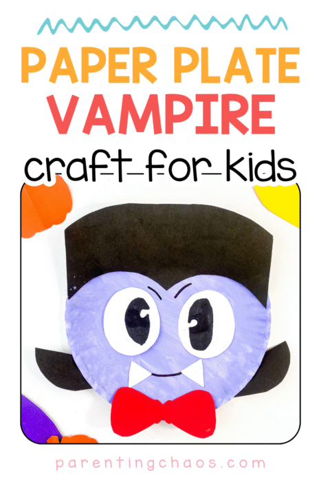 A vampire paper plate craft with a red bow tie and cartoon eyes, surrounded by orange and purple Halloween decorations.