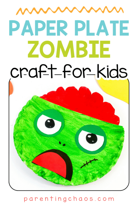 Paper plate zombie craft for kids shown at an angle with red paper brain and green painted plate face. Fun and easy Halloween art idea for preschoolers and kindergartners.
