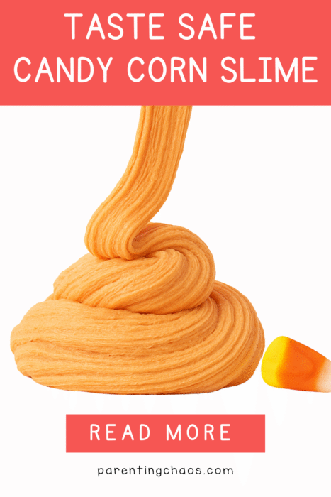 Orange candy corn slime being poured into a swirl with a single candy corn beside it.