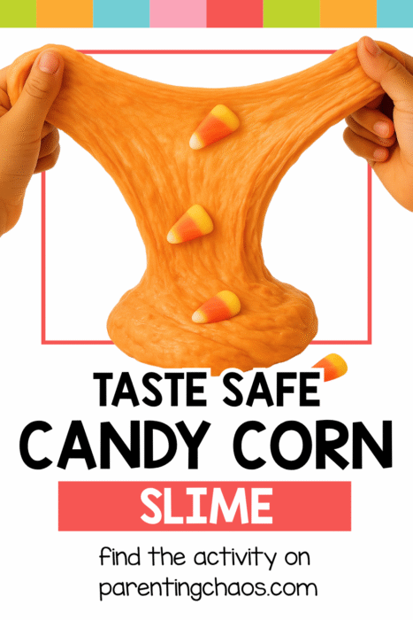 Hands stretching orange candy corn slime with candy corn pieces mixed throughout.