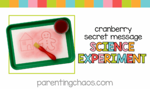 Cranberry secret message science experiment graphic featuring a green tray with the finished painting and bold colorful text reading “Cranberry Secret Message Science Experiment” with the Parenting Chaos website name below.