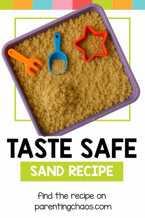 Top-down view of a purple tray filled with taste-safe sand, orange and blue scoops, and a red star mold used for sensory play.